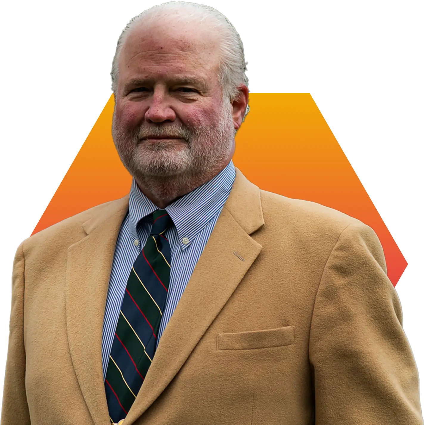 An older man with a white beard wears a tan blazer, blue striped shirt, and striped tie, standing in front of a vibrant orange and yellow gradient background.