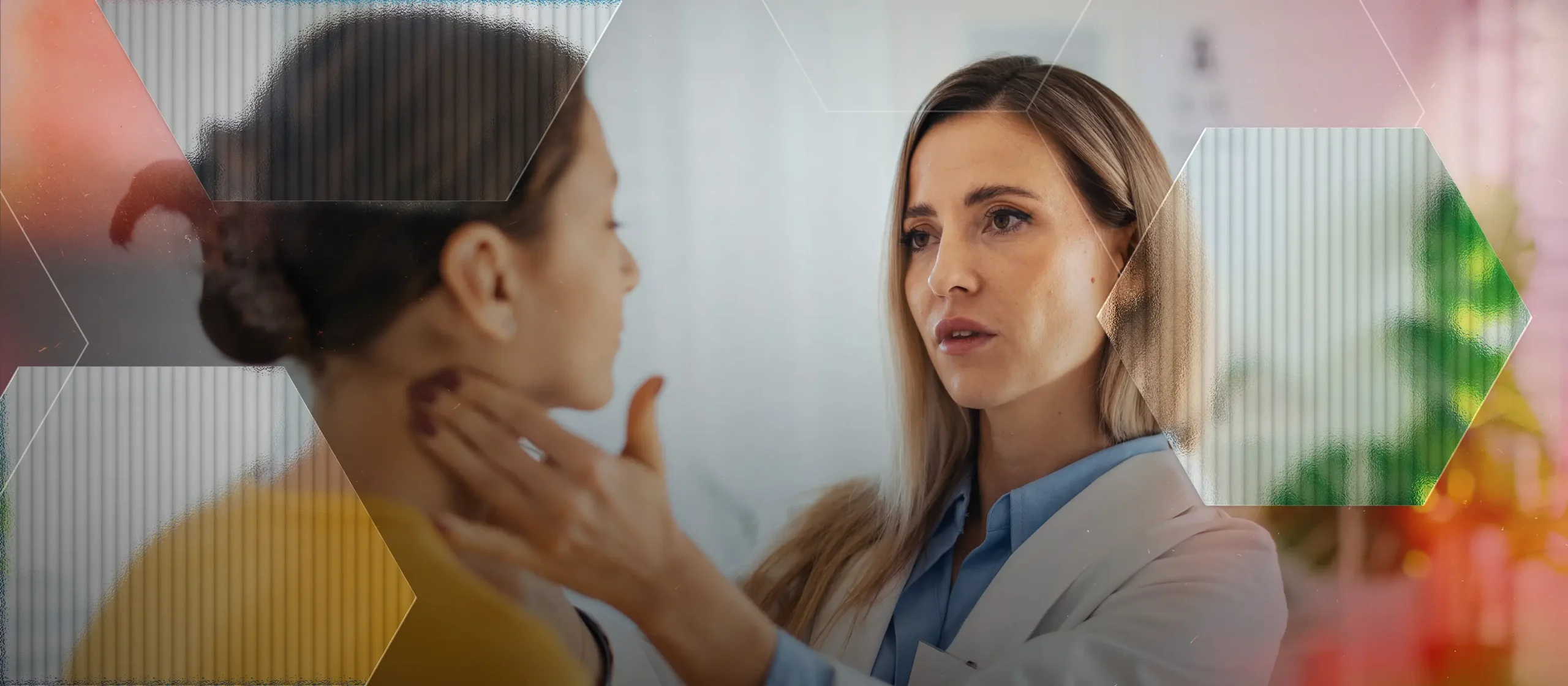 A female doctor examines a woman’s neck and jawline, gently touching her throat, likely checking for lumps or swelling during a medical consultation. The setting appears to be a modern clinic.